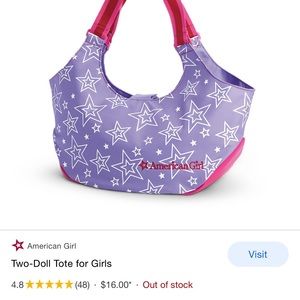 2 sets of EUC doll and mini doll holders.